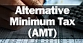 A person calculates tax using a calculator with documents displaying tax information, emphasizing Alternative Minimum Tax (AMT).