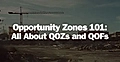 Construction site with a crane and partially cleared land, titled 'Opportunity Zones 101: All About QOZs and QOFs'.