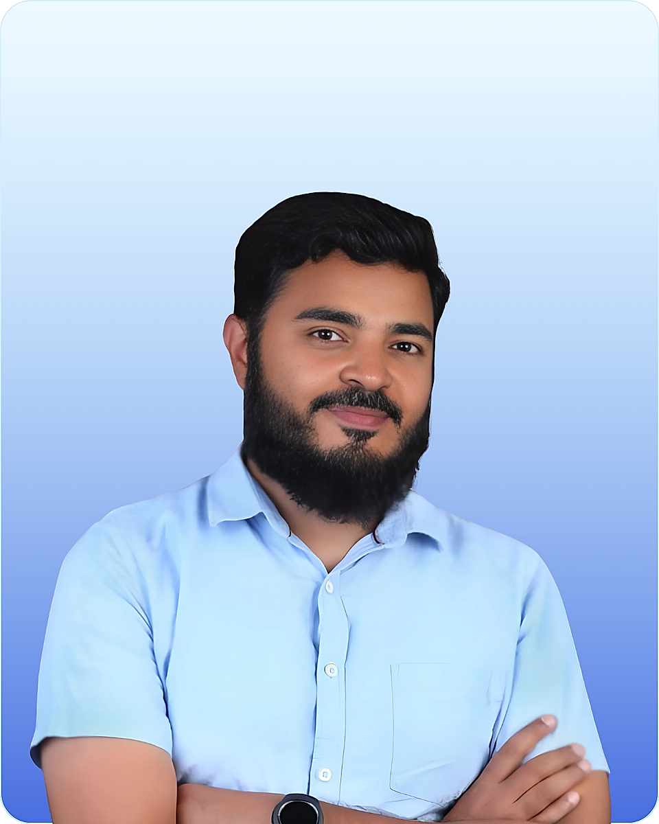 Portrait of a man in a light blue shirt against a blue gradient background